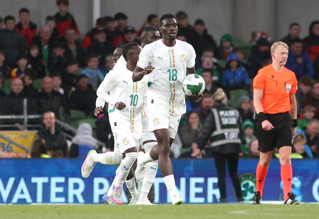 Ismaila Sarr celebrates scoring for Senegal