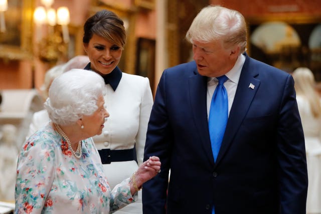 The Queen and US President Donald Trump view a special exhibition in the Picture Gallery of items from the Royal Collection of historical significance to the US