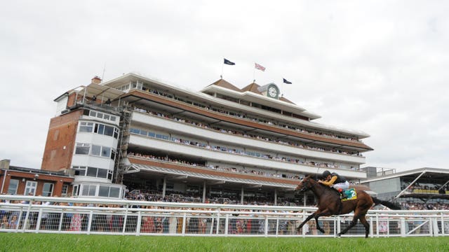 Andrea Atzeni on board Waldpfad wins the Hackwood Stakes