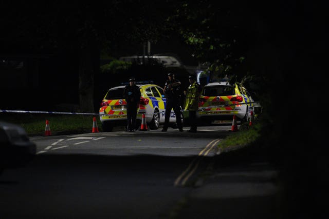 Emergency services at the scene on Thursday night (Ben Birchall/PA)