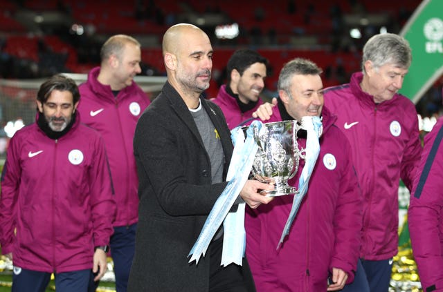 Pep Guardiola with the Carabao Cup trophy