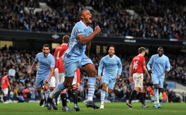 Vincent Kompany celebrates his decisive goal in the 2012 title race 