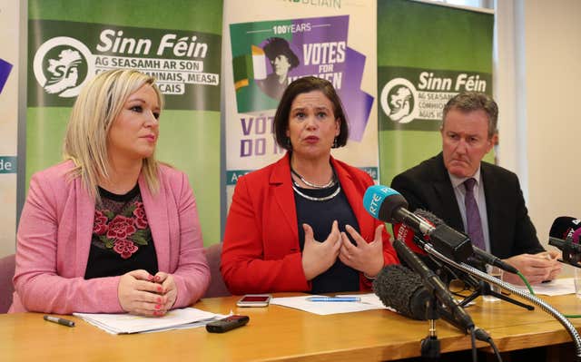 Sinn Fein’s vice president Michelle O’Neill, left, president Mary Lou McDonald and Conor Murphy at a press conference at Parliament Buildings (Niall Carson/PA)