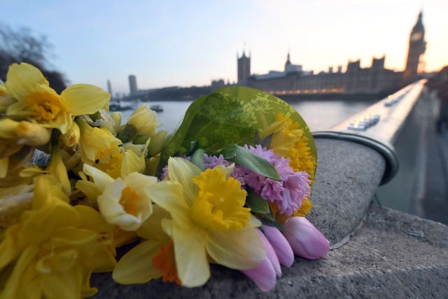 Flowers and candle lights on Westminster Bridge, London
