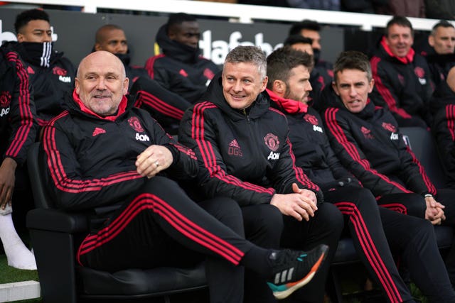 Mike Phelan (left) was previously assistant to Sir Alex Ferguson