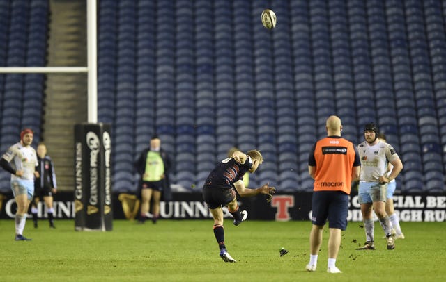 Jaco Van Der Walt kicks a penalty