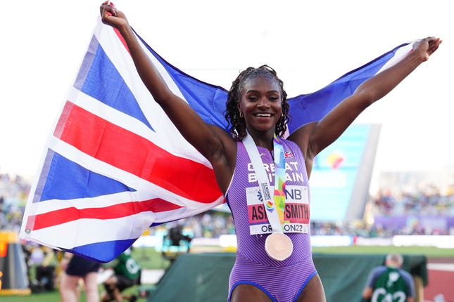 Great Britain’s Dina Asher-Smith celebrates her bronze medal in the 200 metres at the 2022 World Championships in Eugene