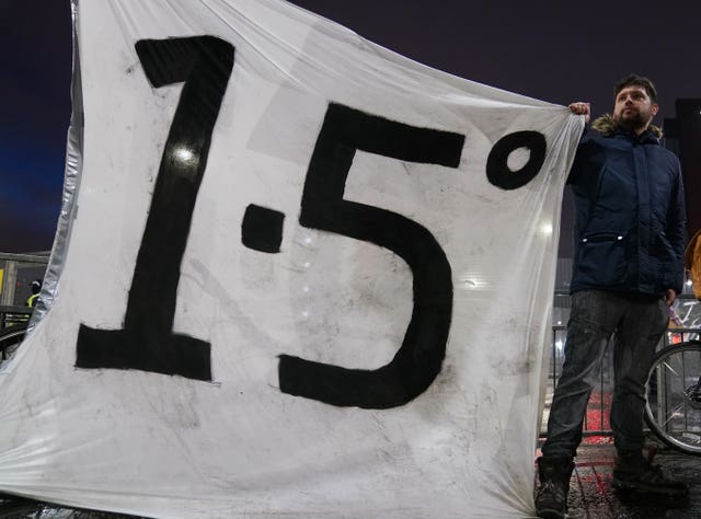 Climate activists protesting (Andrew Milligan/PA)