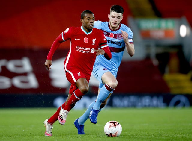 Georginio Wijnaldum runs past West Ham's Declan Rice