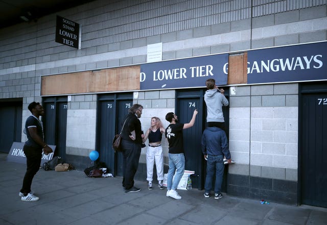 Eager fans took mementos of White Hart Lane after its final game in May 2018