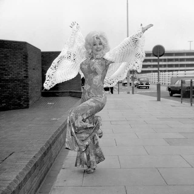 Dolly Parton at Heathrow Airport in 1976 to take part in the eighth International Festival of Country Music at Wembley