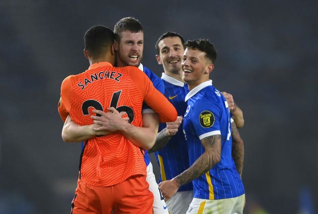 Brighton celebrate winning their first home game of the season as they beat Tottenham 1-0