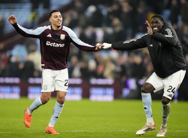 Aston Villa’s Morgan Rogers (left) and Amadou Onana celebrate
