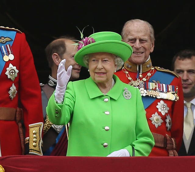 The Queen in green for the Trooping the Colour marking her official 90th birthday (Steve Parsons/PA)