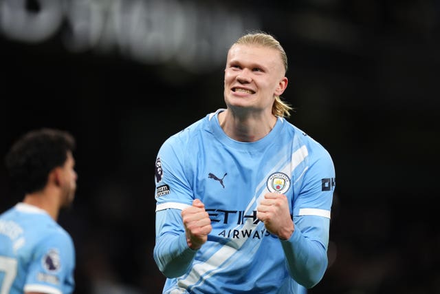 Manchester City’s Erling Haaland smiles and clenches his fists during a home match