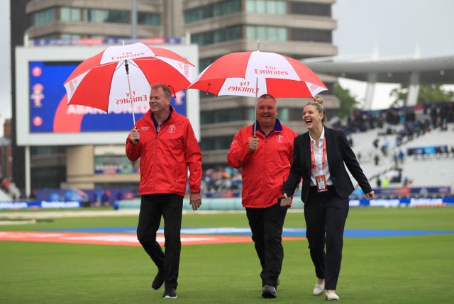 Umbrellas and the World Cup - a frustratingly familiar sight in the last week (Simon Cooper/PA)