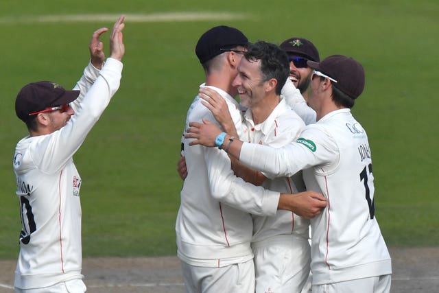 Graham Onions, centre, took 723 first-class wickets in a stellar playing career (Anthony Devlin/PA)