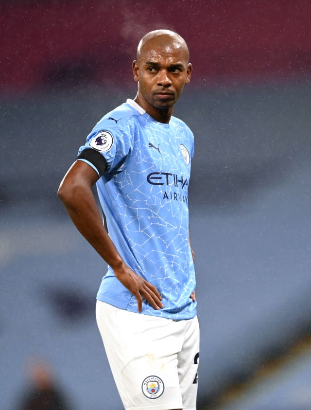 City manager Guardiola (right) has been impressed with Fernandinho (left) this season