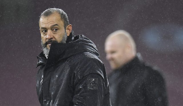 Wolves manager Nuno Espirito Santo, left, watches on 