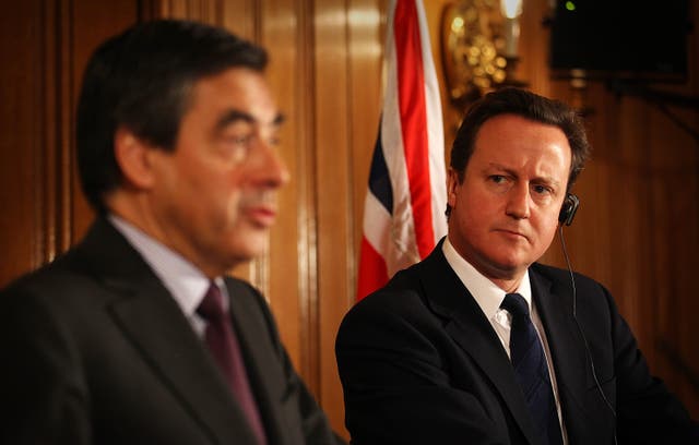 Francois Fillon with David Cameron at a Downing Street briefing (Peter Macdiarmid/PA)