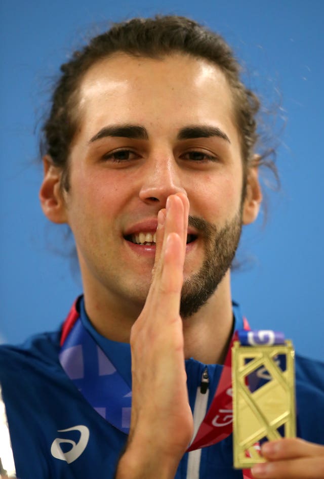 Italy’s Gianmarco Tamberi, sporting his trademark half-beard, with his high jump gold medal 