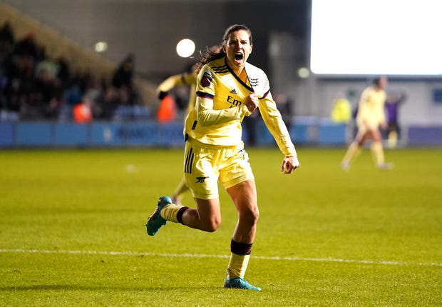 Tobin Heath celebrates her key goal against Manchester City