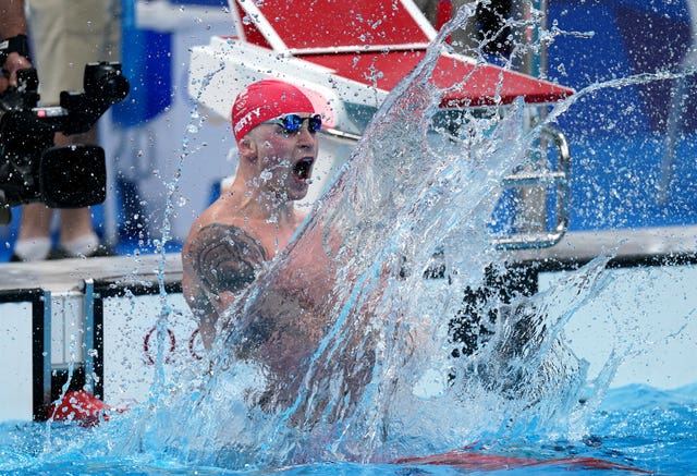 Adam Peaty celebrates his gold medal 