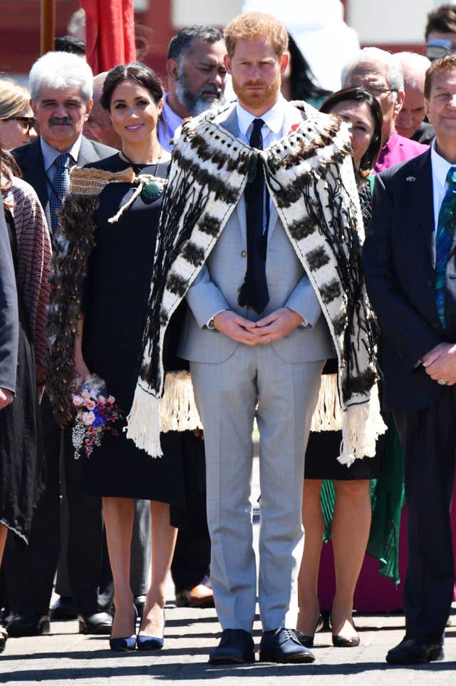 The Duke and Duchess of Sussex wear traditional Maori cloaks called a Korowai during their visit to New Zealand last autumn. Tim Rooke/PA Wire