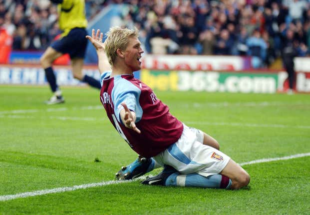 Marcus Allback celebrates his winner for Aston Villa