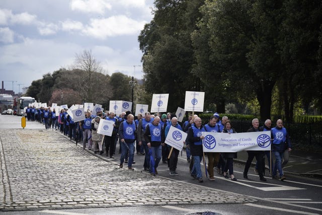 Off-duty members of the Association of Garda Sergeants and Inspectors march on Garda Headquarters
