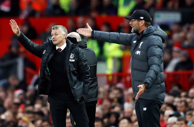 Manchester United manager Ole Gunnar Solskjaer (left) will be hoping to end the winning streak of Liverpool counterpart Jurgen Klopp.