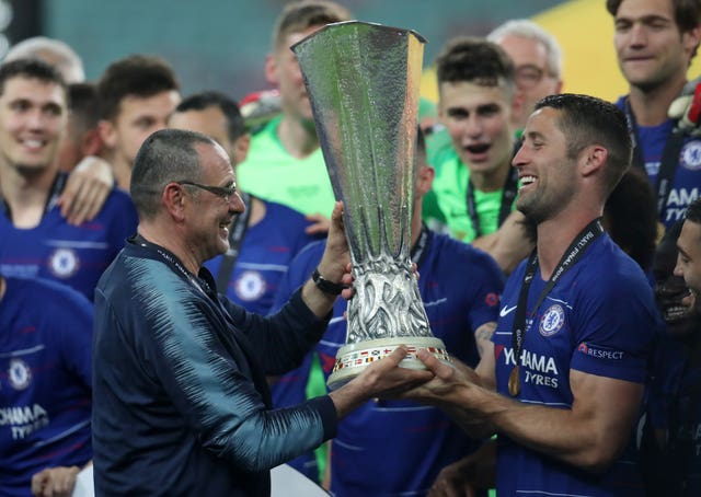 Maurizio Sarri, left, lifts the Europa League 