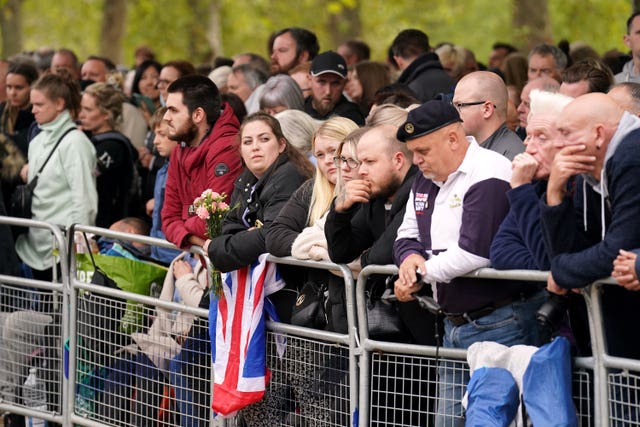 Members of the public gathered to pay their respects on The Mall