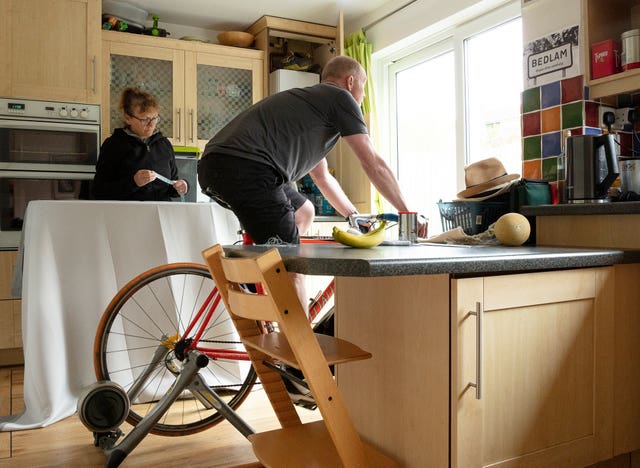 A photo issued by Historic England from its Picturing Lockdown Collection of Ann and Alun Ball at home in Fulwood, Sheffield, by Historic England photogapher Alun Bull 