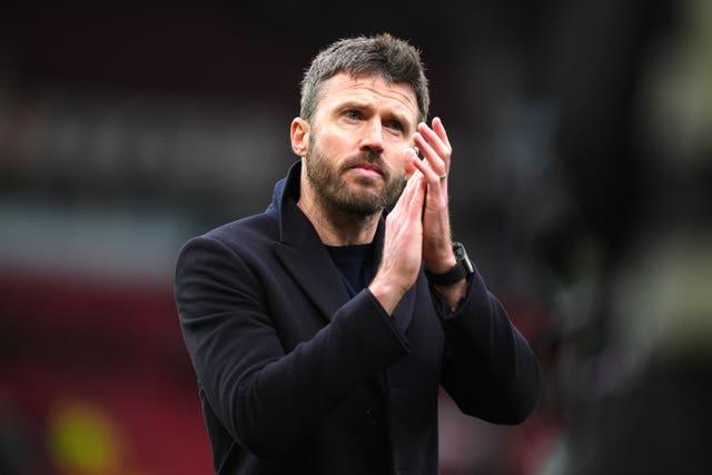 Manchester United manager Michael Carrick applauds the fans following Premier League victory over Aston Villa