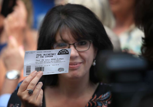 A Beatles fan with a free ticket