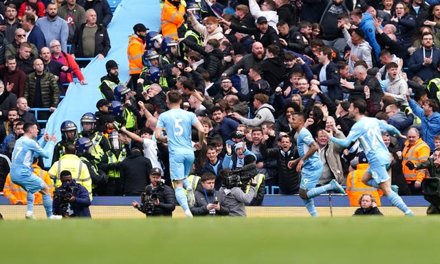 Manchester City retain slender lead after thrilling draw with rivals Liverpool