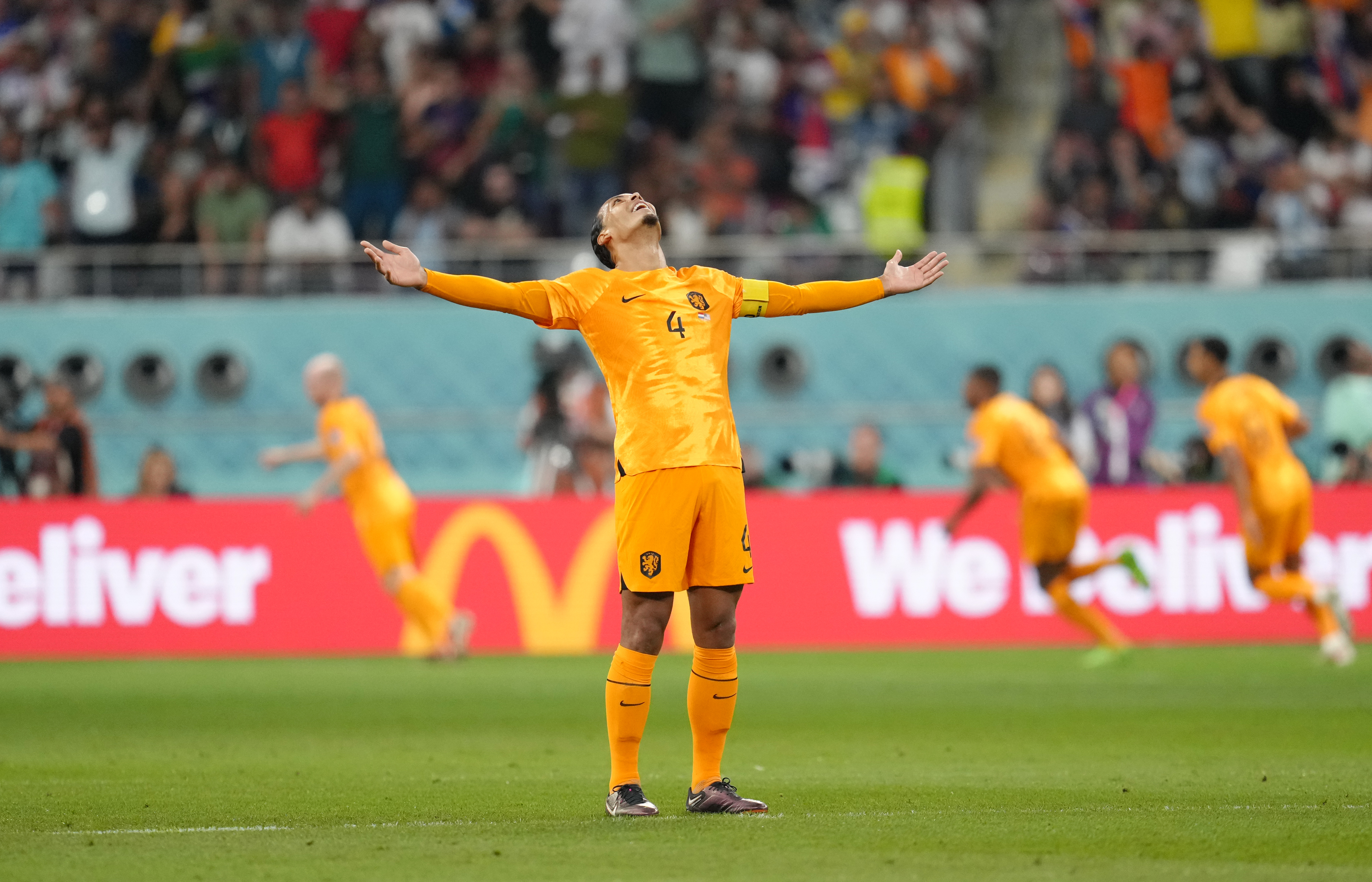 Virgil van Dijk celebrates Memphis Depay's opening goal