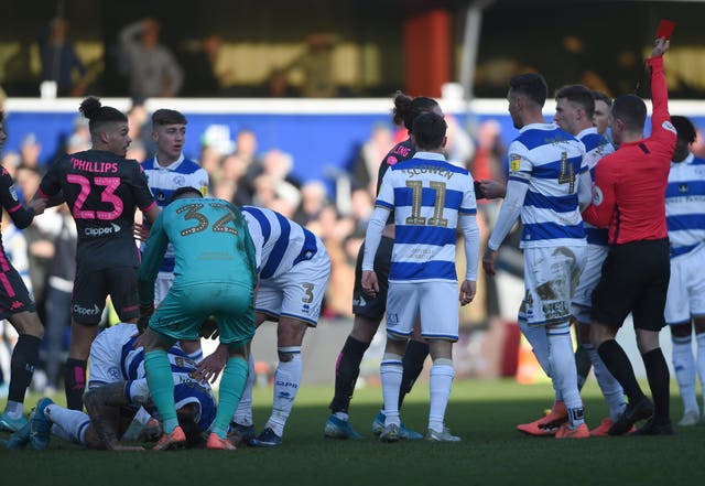 Leeds midfielder Kalvin Phillips is sent off by referee Peter Bankes at QPR