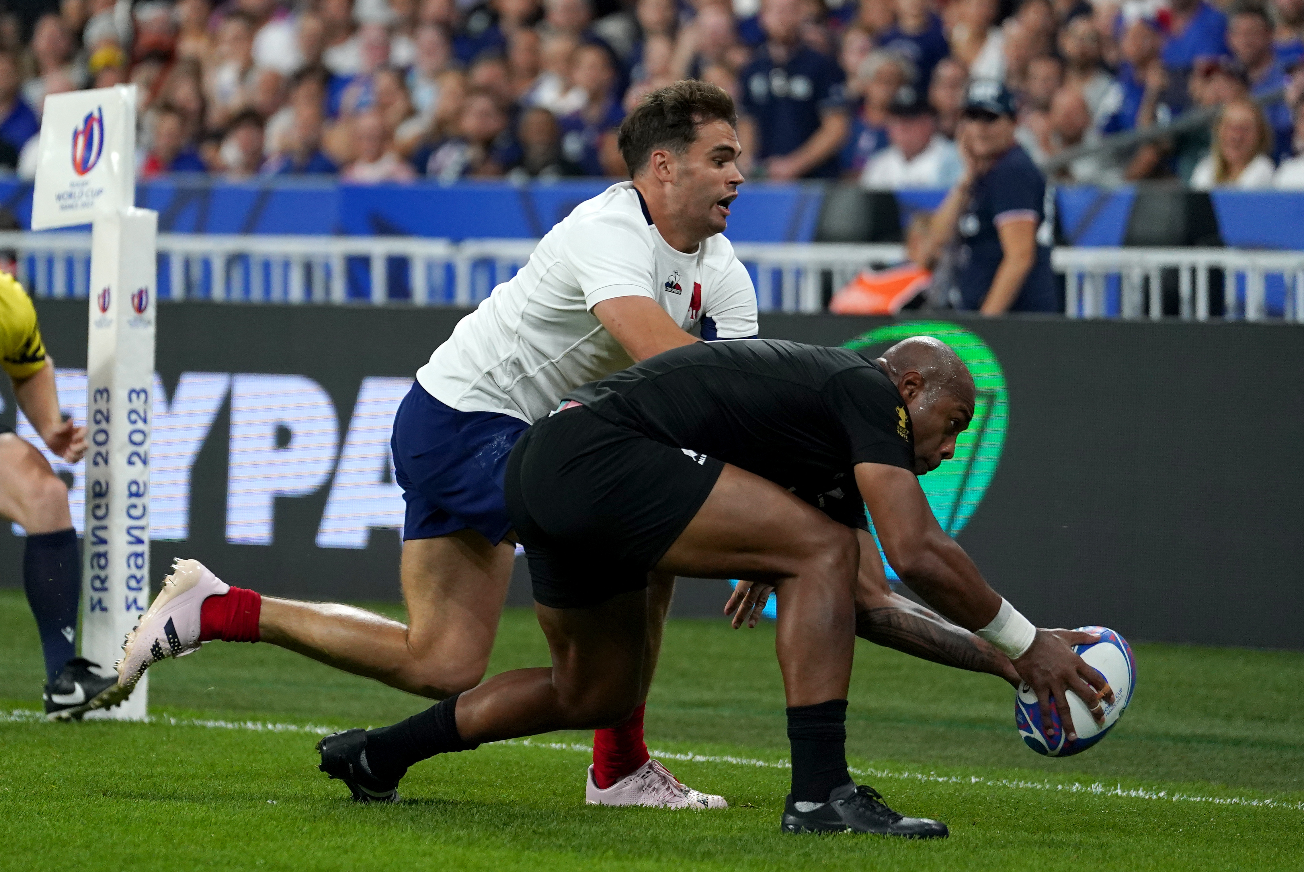 New Zealand wing Mark Telea scored two tries in the World Cup opener against 
