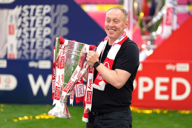 Nottingham Forest manager Steve Cooper celebrates with the trophy after victory in the Sky Bet Championship play-off final at Wembley