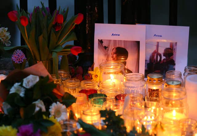 Pictures and candles at a vigil honouring Anna Campbell in her home town (Gareth Fuller/PA)