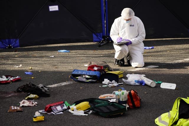 A forensic officer at Regency Court in Brentwood, Essex, where two teenage boys died in the early hours of Sunday morning