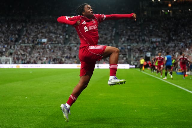 Rio Ngumoha jumps in celebration