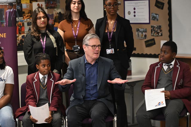 Prime Minister Sir Keir Starmer talks to school pupils
