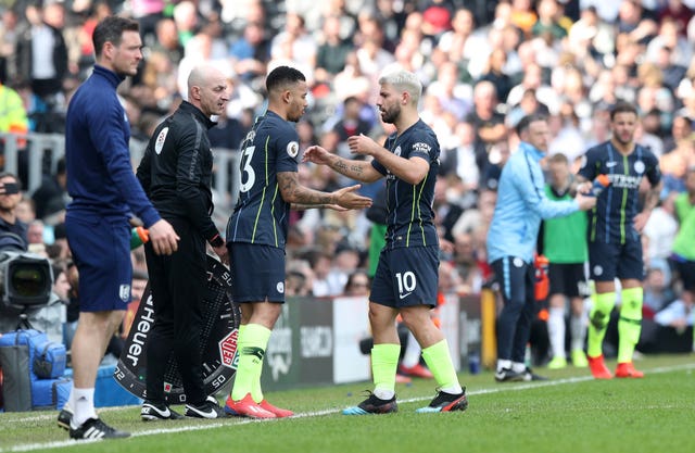 Sergio Aguero (right) is substituted for Gabriel Jesus at Fulham