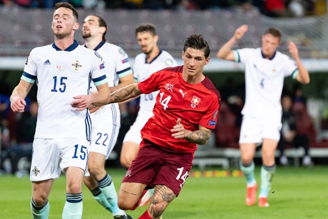 Switzerland''s Steven Zuber celebrates scoring the opening goal