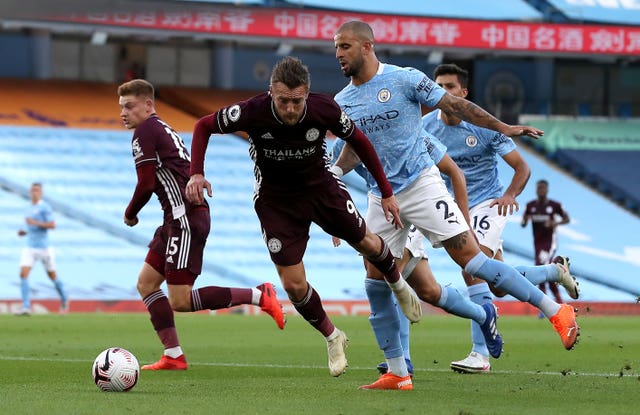 Jamie Vardy, centre, is brought down for one of Leicester's three penalties against Manchester City