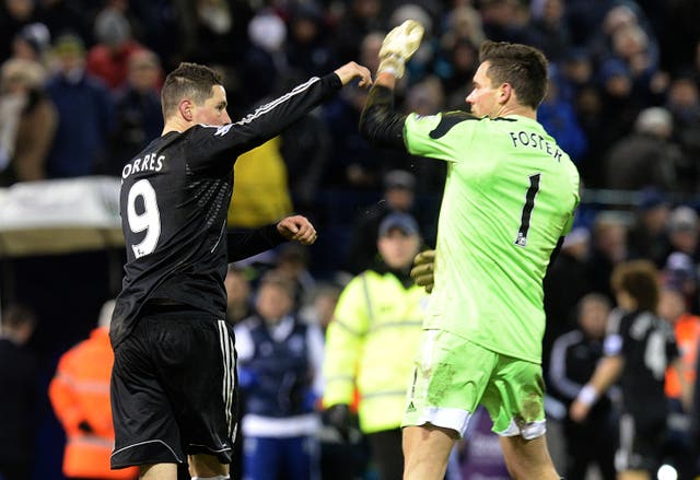 Torres (left) and West Brom goalkeeper Ben Foster have a dispute following a 1-1 draw at the Hawthorns