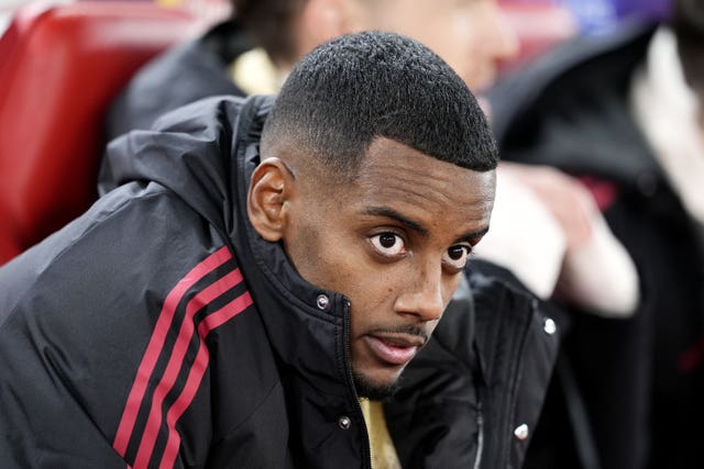 Alexander Isak sits on the Liverpool bench